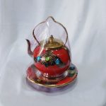 Plat avec miroir et petite théière décoré en cuivre